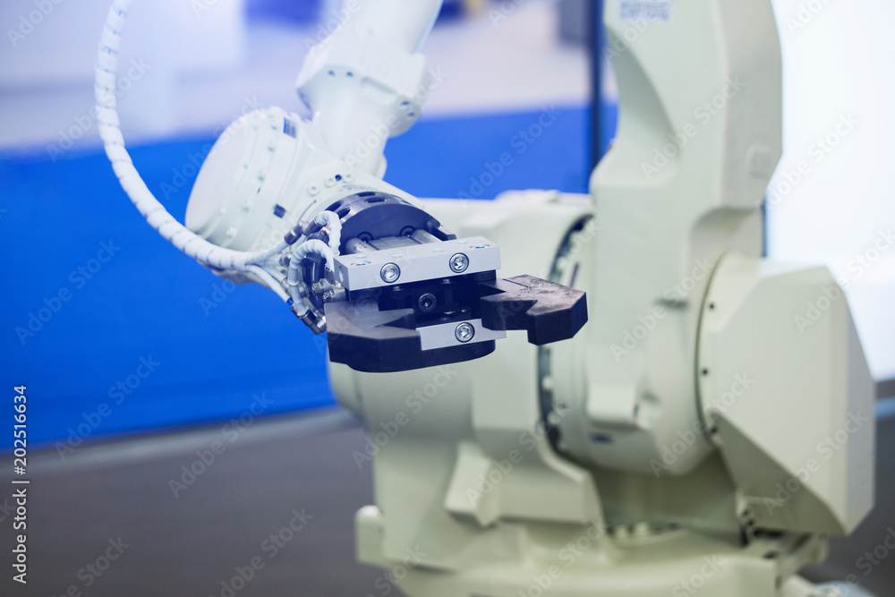 Aufkleber A robotic arm. Automatic robot in a smart factory. Assembly line