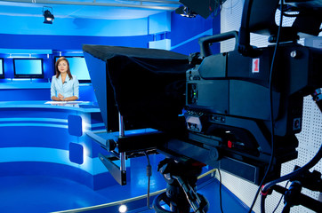 TV anchorwoman at TV studio