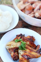 Grilled chicken wings with spicy sauce delicious