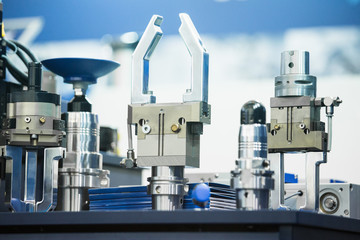 Removable nozzles for robotic arm