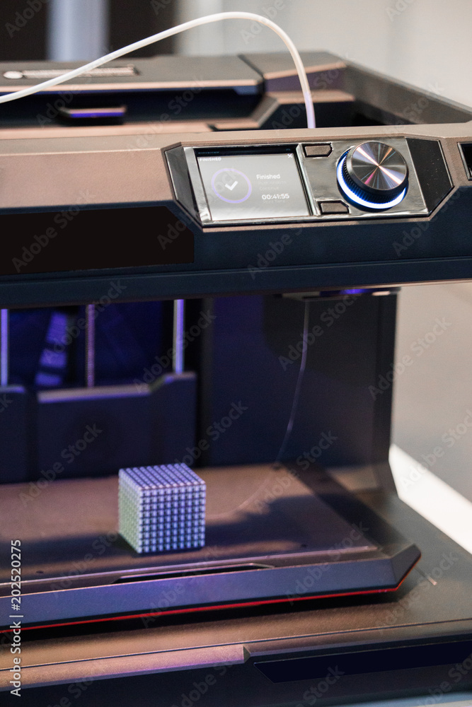 Poster a desktop 3d printer in the laboratory for prints a structure from a polymer