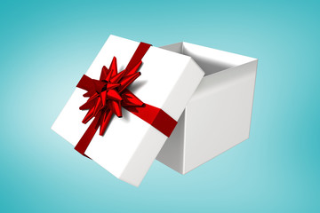 White and red gift box against blue vignette