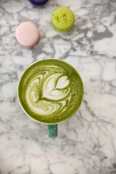 Matcha latte with macarons