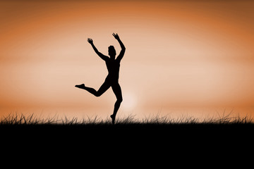 Obraz na płótnie Canvas Fit brunette jumping and posing against sunrise