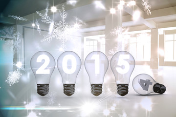 2015 with light bulb against snowflake pattern in white room