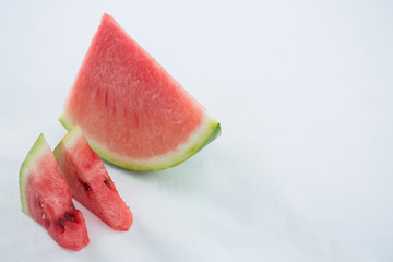 Watermelon pieces on white background