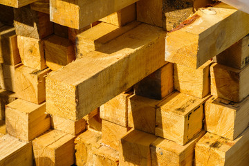 Square sawn timber and beams for construction, close-up