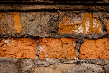 Close up macrophotography background texture of old cracked wall bricks