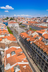 Lisbon, Portugal city skyline over Santa Justa Rua.