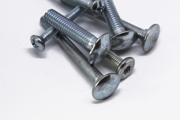 Iron bolts on white background