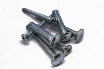 Iron bolts on white background