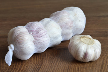 Garlic on wooden background