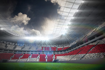 Digitally generated english national flag in football stadium with fans in white © vectorfusionart
