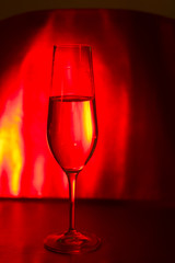 Champagne glass in disco party bar