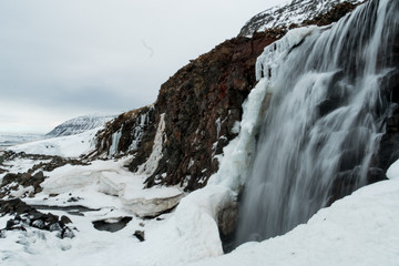partially frozen waterfall