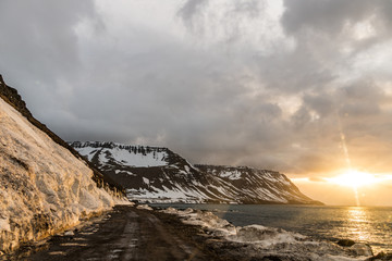 Fototapeta na wymiar Sunet over atlantic ocean and Iceland shore