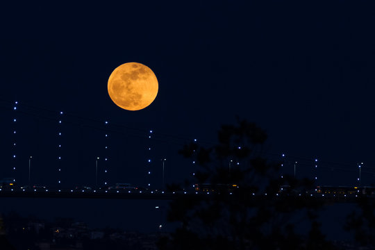 Super Blue Blood Moon Behind Bosphorus Bridge in Istanbul, Turkey