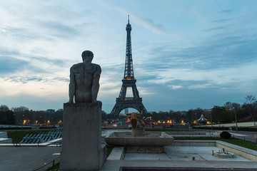 Fototapeta na wymiar Eary morning at the Eiffel Tower in Paris, France