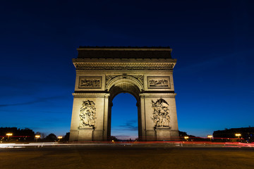 Fototapeta na wymiar Arc De Triomphe in Paris, France at night