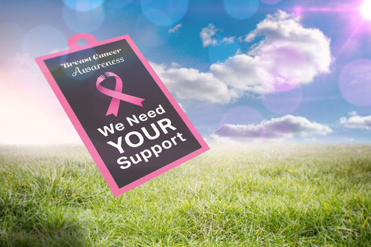 Breast cancer awareness message against sunny landscape
