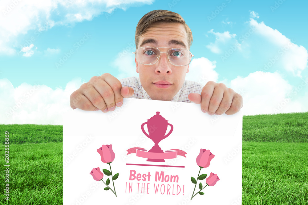 Poster geeky hipster smiling and showing card against field and sky
