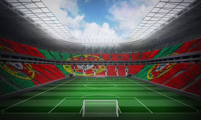 Digitally generated portugese national flag against football stadium