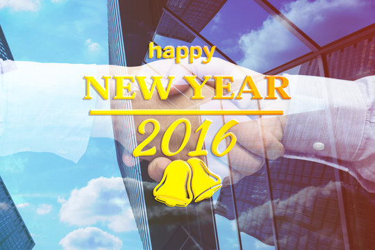 happy new year message against composite image of hand shake in front of wires