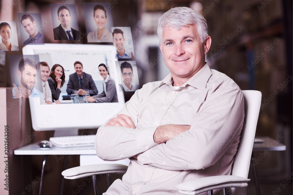 Aufkleber warehouse manager using computer against portrait of a positive team sitting at a table