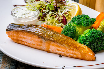 Salmon steak on the grill