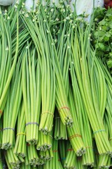 Onion flower stem for cooking in market