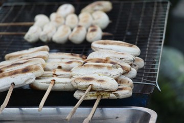 Grilled banana on stove in the market