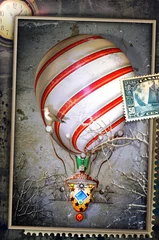 Foto op Canvas Vintage postcard, stamp and collage with hot air balloon © Rosario Rizzo