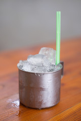 Empty ice in aluminium mug for drink in Thai restaurant