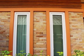 Fototapeta premium Window and brick wall is vintage style