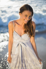 Fototapeta na wymiar Beautiful woman on the beach