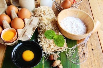 Making noodle with wheat flour and egg for cooking