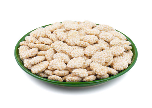Indian Sweet Food Rewri also know as rewadi are popular in the Indian makar sankranti festival, Rewri is crisp toffee like dessert made from gudh (with spices) with coating of sesame seeds.