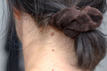 Close up view on the back of a female neck