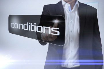 Businessman pointing to word conditions against technology interface