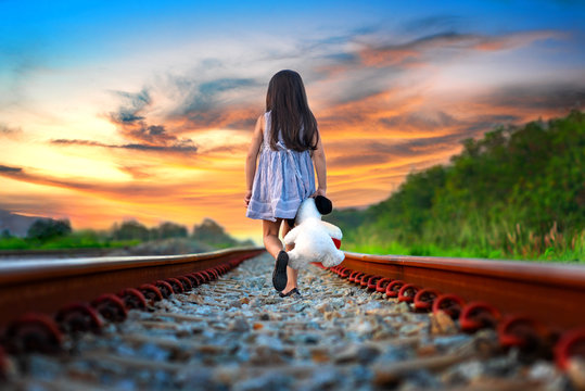 Little Girl Run Away From Home, Walking On Railway Alone, Upset With Parent And Disappoint Mind, Sadly Walikng With Dollmate