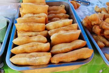 Deep fried dough put sweet condensed milk