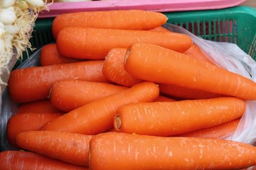Fresh organic carrots for cooking in market