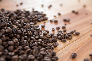 Fototapeta na wymiar Roasted coffee beans spilled