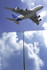 Flight of a passenger plane above the city center.