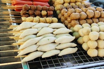 Fried meatballs and sausage at street food