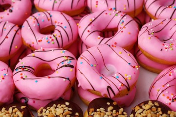 A lot of donut and strawberry jam