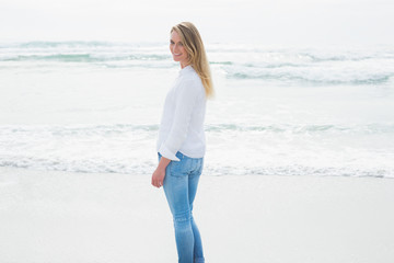 Portrait of a smiling casual woman at beach