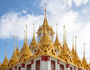 details of Wat Ratchanatdaram roofs in Bangkok , Thailand