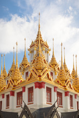 details of Wat Ratchanatdaram roofs in Bangkok , Thailand