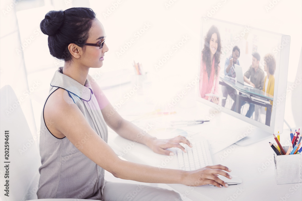 Poster composite image of smiling designer using tablet in office